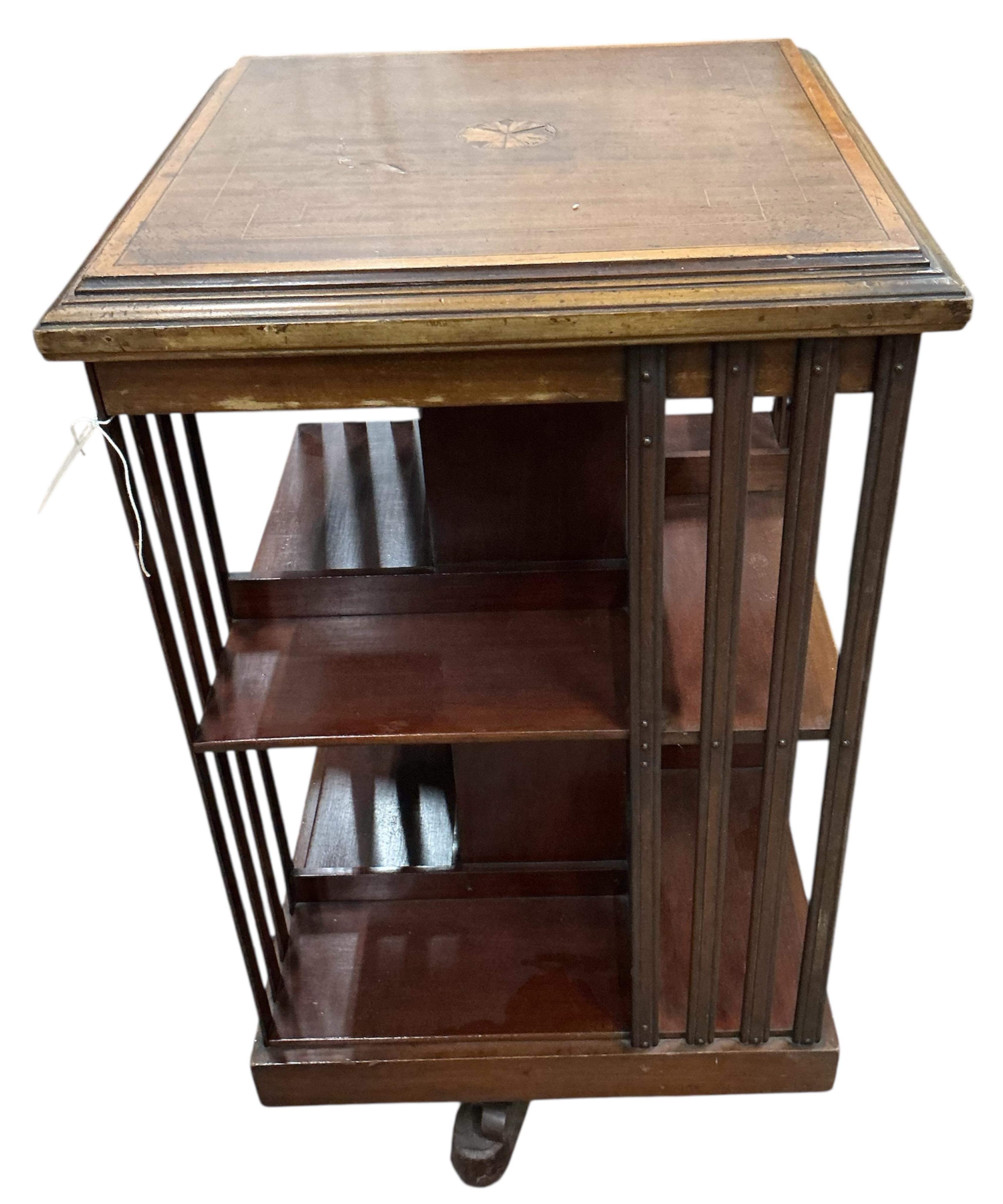 An Edwardian satinwood banded mahogany revolving bookcase, width 48cm, depth 48cm, height 89cm